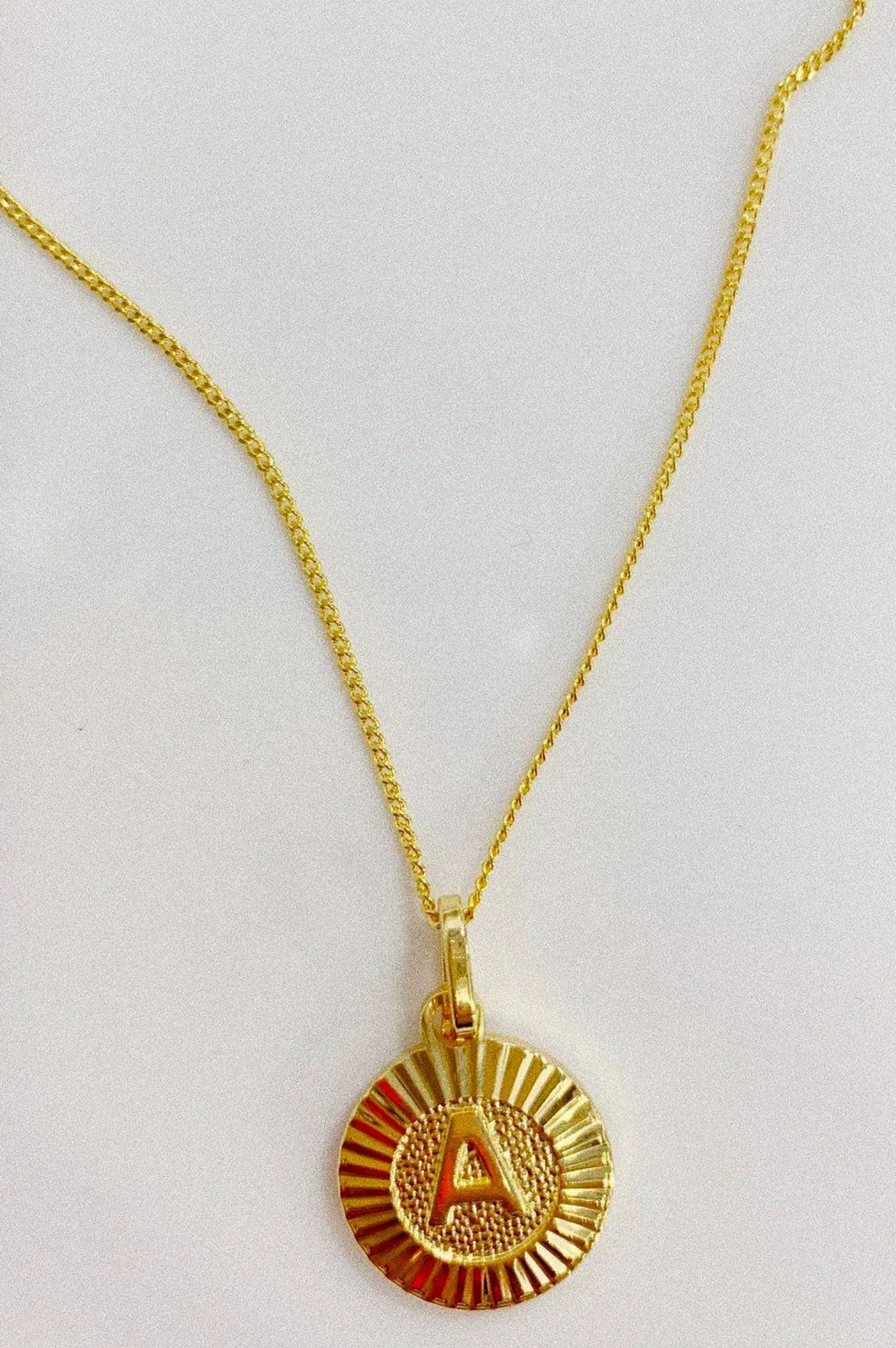 Initial Medallion